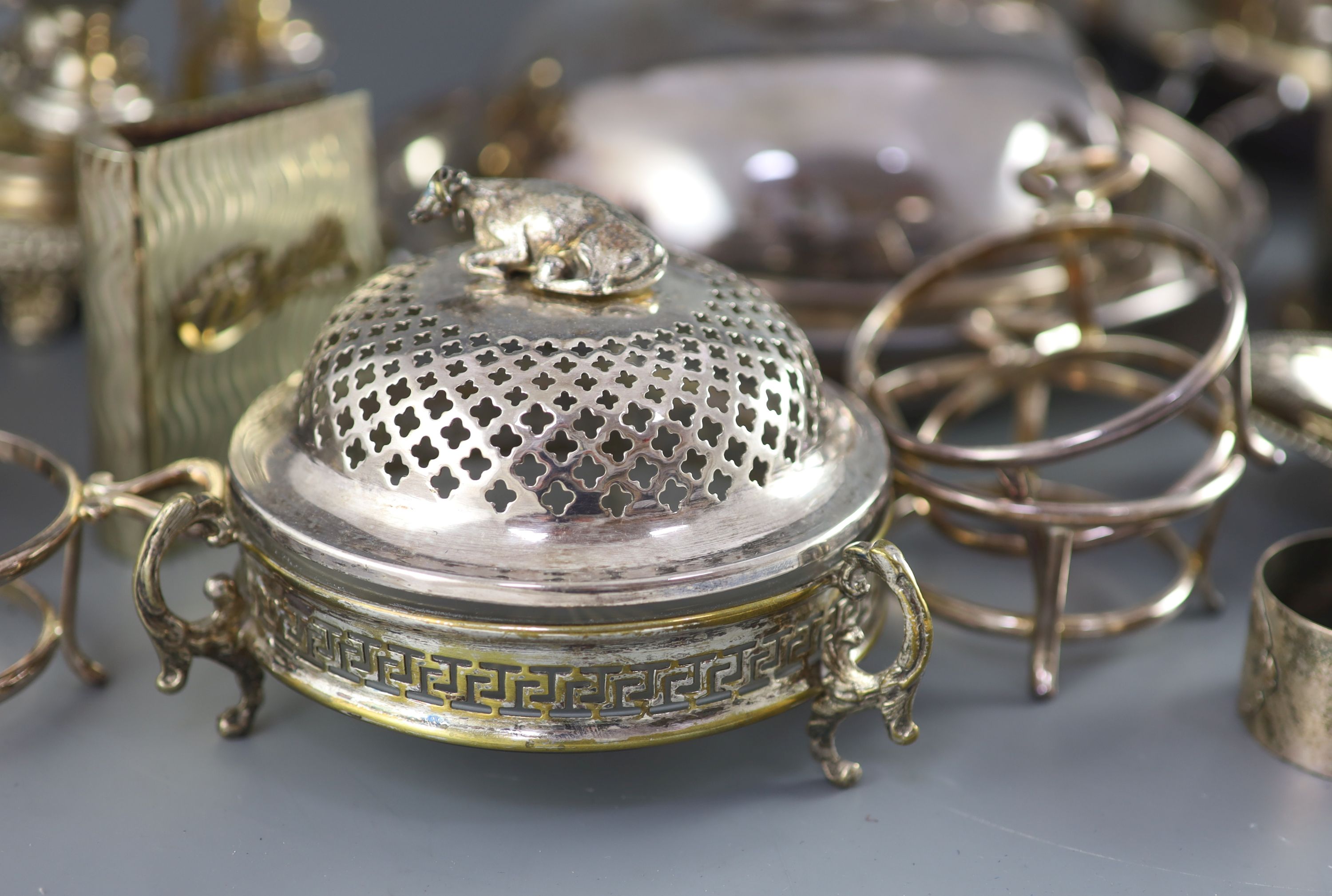 A silver plated egg cruet, a butter dish, a table salt and sundry other plated wares